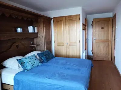 Un ou plusieurs lits dans un hébergement de l'établissement Résidence L'iseran - Spacieux 4 pièces, pieds des pistes, résidence haut de gamme avec piscine, vue splendide sur le Mont Blanc et terrasse Ouest. MAE-8921