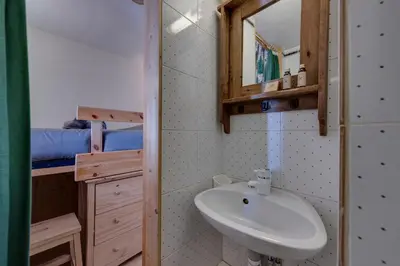 Un ou plusieurs lits dans un hébergement de l'établissement BARME DE L'OURS 2 Bel appartement dans un Chalet