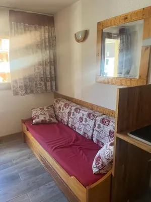 Coin salon dans l'établissement Tignes - Studio rénové pour 3 personnes