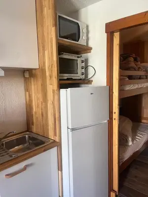 Cuisine ou kitchenette dans l'établissement Tignes - Studio rénové pour 3 personnes