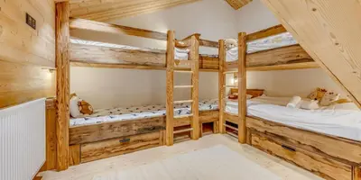 Un ou plusieurs lits dans un hébergement de l'établissement Résidence Le Palais Des Dodes - 6 Pièces pour 12 Personnes MAE-3611