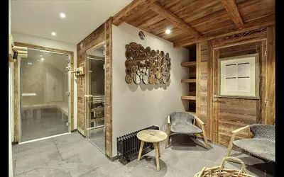 Coin salon dans l'établissement ARC 1950, Appartement 6 couchages, Exposition Ouest, Vue Col des Frêtes, Sauna Hammam Jacuzzi Piscine Vue MontBlanc
