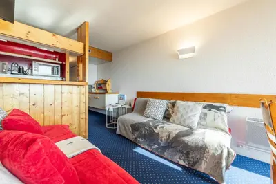 Un ou plusieurs lits dans un hébergement de l'établissement Appartement ambiance cosy Les ARCS 1800