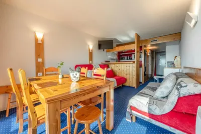 Cuisine ou kitchenette dans l'établissement Appartement ambiance cosy Les ARCS 1800