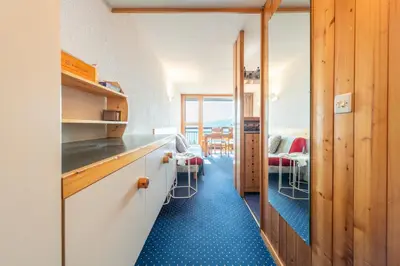 Cuisine ou kitchenette dans l'établissement Appartement ambiance cosy Les ARCS 1800