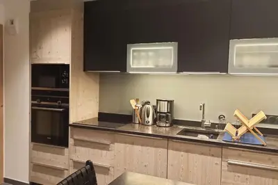 Cuisine ou kitchenette dans l'établissement Paradiski nouveau, cosy et ensoleillé plan Peisey