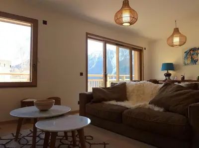 Coin salon dans l'établissement Paradiski nouveau, cosy et ensoleillé plan Peisey