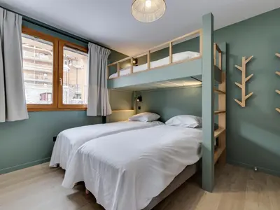 Un ou plusieurs lits dans un hébergement de l'établissement Appartement rénové 3* · Pied des pistes · Balcon · Parking · Wifi - FR-1-502-585