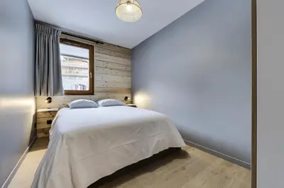 Un ou plusieurs lits dans un hébergement de l'établissement Résidence Maison Neuve - Appartement rénové·Pied des pistes·Balcon·Parking MAE-0391