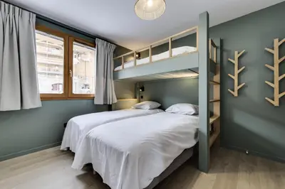 Un ou plusieurs lits dans un hébergement de l'établissement Résidence Maison Neuve - Appartement rénové·Pied des pistes·Balcon·Parking MAE-0391