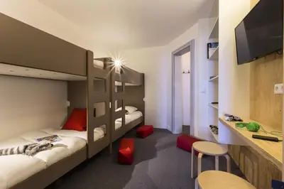 Un ou plusieurs lits dans un hébergement de l'établissement Résidence Aiguille Rouge - Centre station Appartement 3 pièces 8 personnes MAE-4634