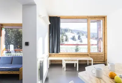 Coin salon dans l'établissement Résidence Lauzieres - Appartement 3 pèces 7 personnes pied des pistes MAE-4734