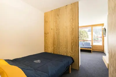 Un ou plusieurs lits dans un hébergement de l'établissement Résidence Lauzieres - Appartement 3 pèces 7 personnes pied des pistes MAE-4734