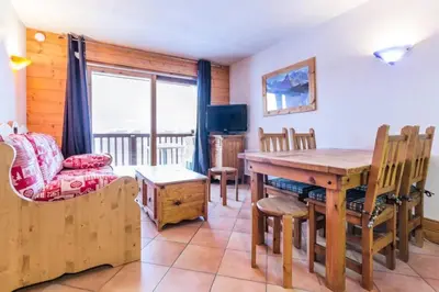 Coin salon dans l'établissement Résidence Alpages Du Chantel - Appartement 3 pièces 6 personnes MAE-4914
