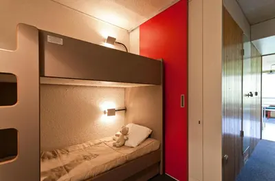Un ou plusieurs lits dans un hébergement de l'établissement Résidence Lauzieres - Studio 5 personnes pied des pistes MAE-5004