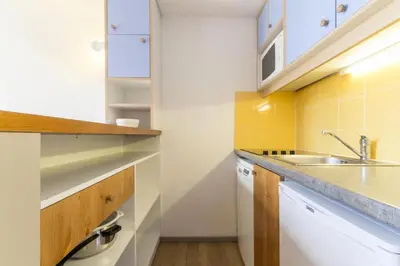 Cuisine ou kitchenette dans l'établissement Résidence Aiguille Grive 3 - Duplex mezaanine 6 personnes au calme MAE-5114