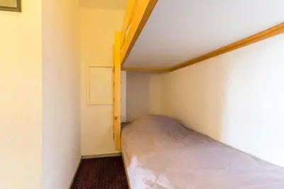 Un ou plusieurs lits dans un hébergement de l'établissement Résidence Aiguille Grive 3 - Duplex mezaanine 6 personnes au calme MAE-5114