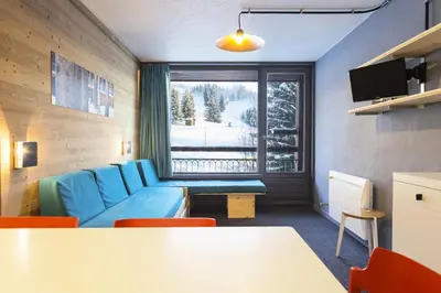 Coin salon dans l'établissement Résidence Lauzieres - Studio 5 personnes pied des pistes MAE-5244