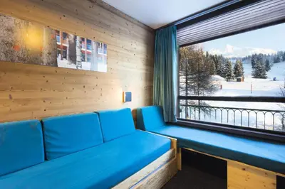 Coin salon dans l'établissement Résidence Lauzieres - Studio 5 personnes pied des pistes MAE-5274