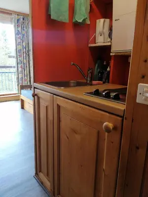 Cuisine ou kitchenette dans l'établissement Résidence Grand Arbois - Studio 4 personnes centre station MAE-5464