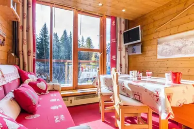 Coin salon dans l'établissement Résidence Aiguille Grive 2 - Duplex meublé pour 5/6 personnes au calme MAE-5534