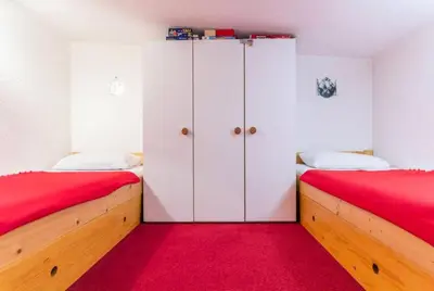Un ou plusieurs lits dans un hébergement de l'établissement Résidence Aiguille Grive 2 - Duplex meublé pour 5/6 personnes au calme MAE-5534