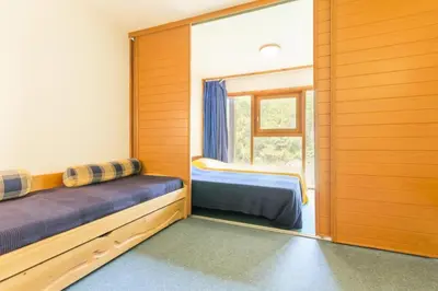 Un ou plusieurs lits dans un hébergement de l'établissement Résidence Aiguille Grive 3 - Duplex mezzanine 6 personnes au calme MAE-5544
