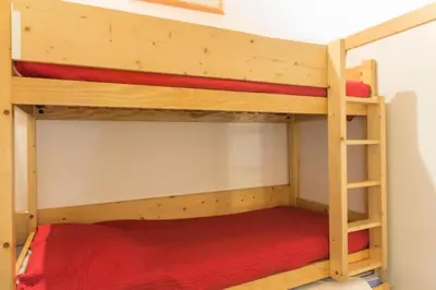 Un ou plusieurs lits superposés dans un hébergement de l'établissement Résidence Archeboc - Duplex mezzanine 5/6 personnes au calme MAE-5564