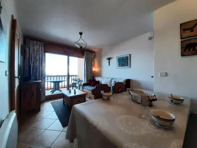 Coin salon dans l'établissement Résidence Saint Bernard - Appartement de standing 3 pièces 6 personnes MAE-5654