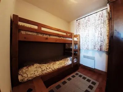 Un ou plusieurs lits dans un hébergement de l'établissement Résidence Saint Bernard - Appartement de standing 3 pièces 6 personnes MAE-5654