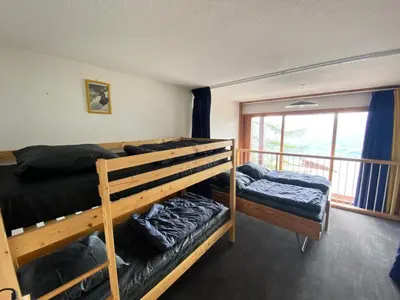 Un ou plusieurs lits dans un hébergement de l'établissement Résidence Aiguille Grive 3 - Duplex 4/5 personnes au calme MAE-5724
