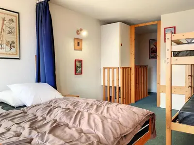 Un ou plusieurs lits dans un hébergement de l'établissement Résidence Aiguille Grive 3 - Duplex 4/5 personnes au calme MAE-5724
