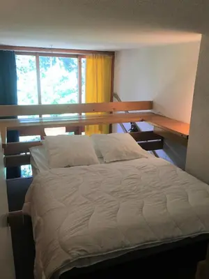 Un ou plusieurs lits dans un hébergement de l'établissement Résidence Aiguille Grive 1 - Duplex mezzanine 5 personnes au calme MAE-5884