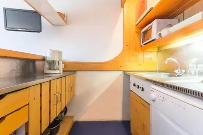 Cuisine ou kitchenette dans l'établissement Résidence Lauzieres - Studio 5 personnes pied des pistes MAE-5934