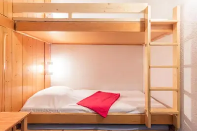 Un ou plusieurs lits dans un hébergement de l'établissement Résidence Lauzieres - Studio 5 personnes pied des pistes MAE-5934