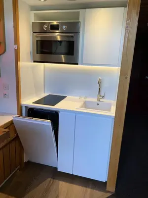 Cuisine ou kitchenette dans l'établissement Résidence Mirantins 3 - Studio mezzanine 4 personnes proche Transarc MAE-6084