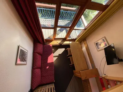 Coin salon dans l'établissement Résidence Mirantins 3 - Studio mezzanine 4 personnes proche Transarc MAE-6084