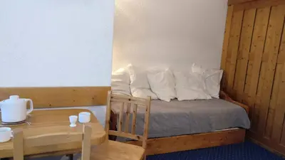 Un ou plusieurs lits dans un hébergement de l'établissement Résidence Belles Challes - Studio 4 personnes pied des pistes MAE-6094