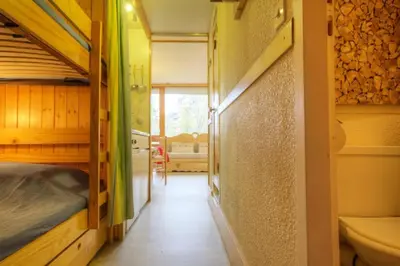 Un ou plusieurs lits dans un hébergement de l'établissement Résidence Armoise - Studio 3 personnes centre station MAE-6214