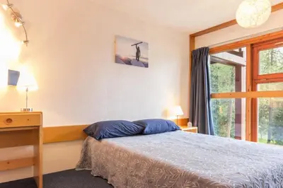 Un ou plusieurs lits dans un hébergement de l'établissement Résidence Aiguille Grive 3 - Duplex mezzanine 6 personnes au calme MAE-6304