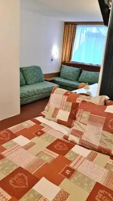Un ou plusieurs lits dans un hébergement de l'établissement Résidence Belles Challes - Studio 4 personnes pied des pistes MAE-6474