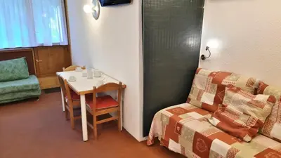 Un ou plusieurs lits dans un hébergement de l'établissement Résidence Belles Challes - Studio 4 personnes pied des pistes MAE-6474