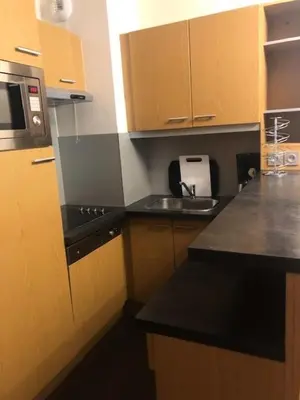 Cuisine ou kitchenette dans l'établissement Résidence Les Souverains Edenarc - Appartement de standing 2 Pièces 4 persones MAE-0924