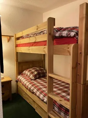 Un ou plusieurs lits dans un hébergement de l'établissement Résidence Aiguille Grive 3 - Appartement spacieux · Ski aux pieds · Balcon MAE-3954