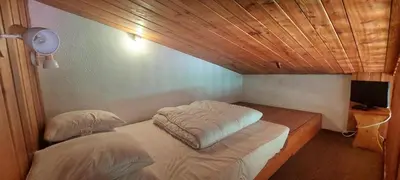 Un ou plusieurs lits dans un hébergement de l'établissement Résidence Tournavelles 1 - Spacieux appartement 9 personnes front de neige MAE-1234