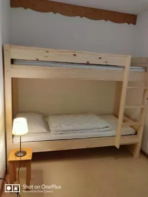 Un ou plusieurs lits dans un hébergement de l'établissement Les Balcons de la Vanoise appartement Val-Cenis-Termignon