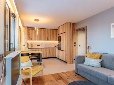 Cuisine ou kitchenette dans l'établissement Appartement neuf avec terrasse, SPA et parking inclus - 6 pers - FR-1-352-103
