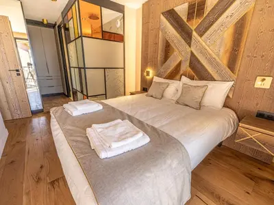 Un ou plusieurs lits dans un hébergement de l'établissement Appartement neuf avec terrasse, SPA et parking inclus - 6 pers - FR-1-352-103