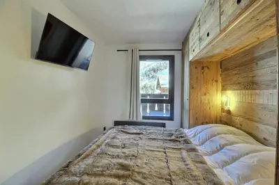 Un ou plusieurs lits dans un hébergement de l'établissement ARC 1950, Appartement 2 chambres, 8 personnes