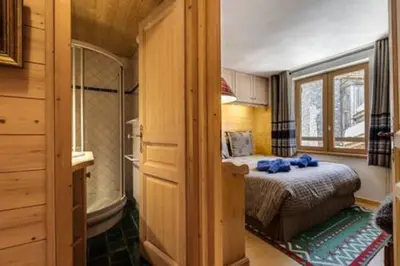 Un ou plusieurs lits dans un hébergement de l'établissement Chalet Ancolie 2e Appartement cosy dans un chalet